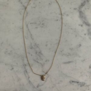 Gold plated hand necklace